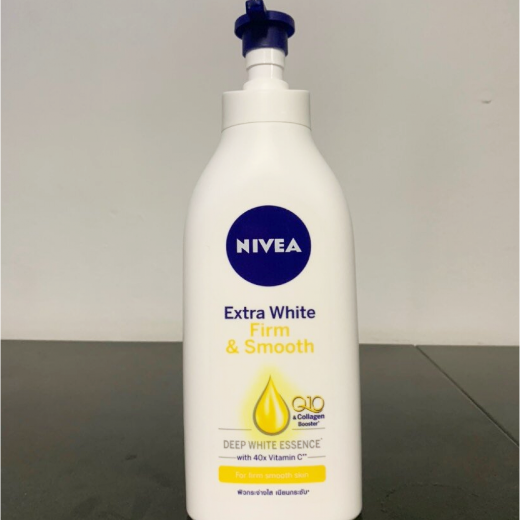 Nivea Extra White Firm and Smooth Lotion 600ml.1Free1